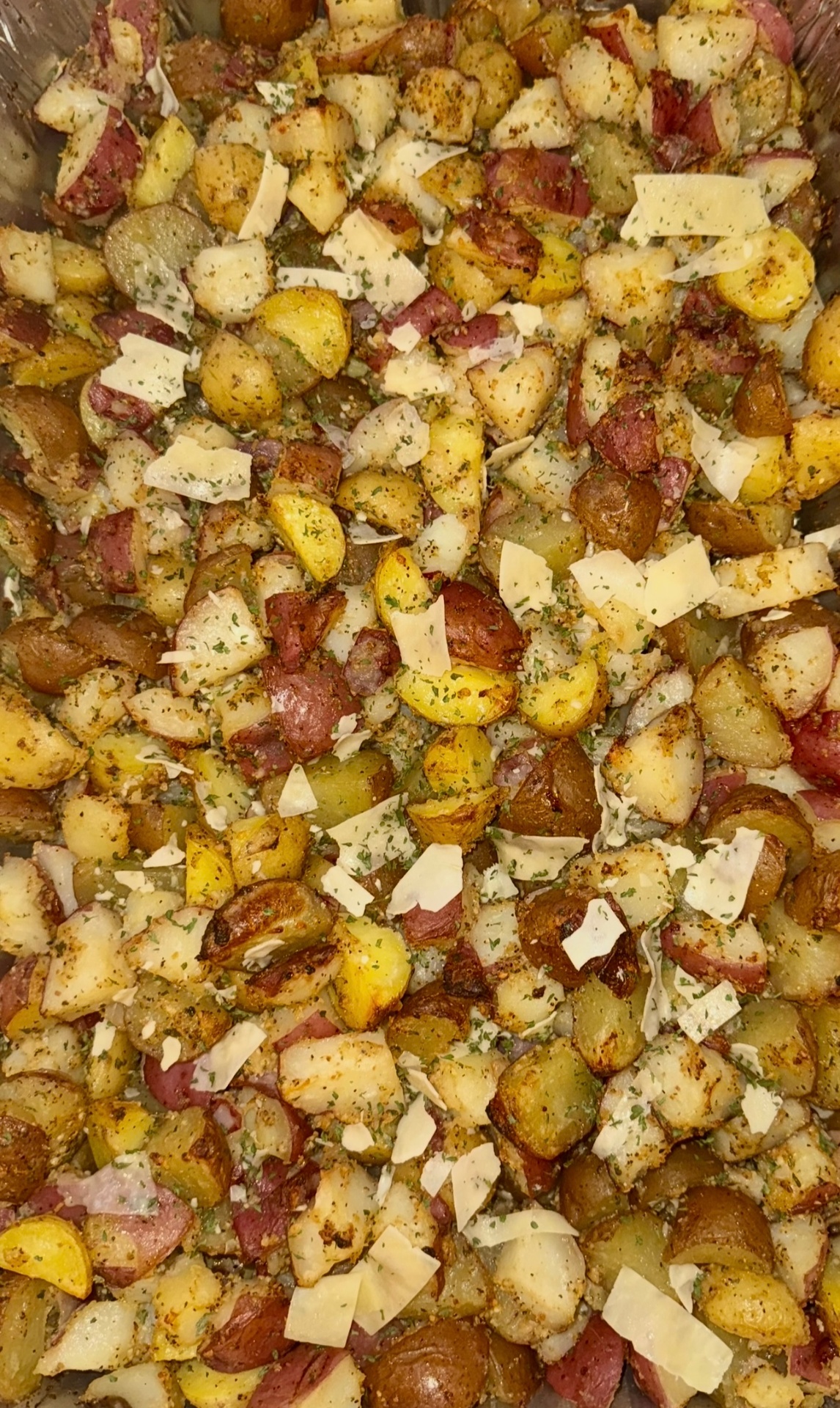 Garlic herb roasted red potatoes with shaved parmesan