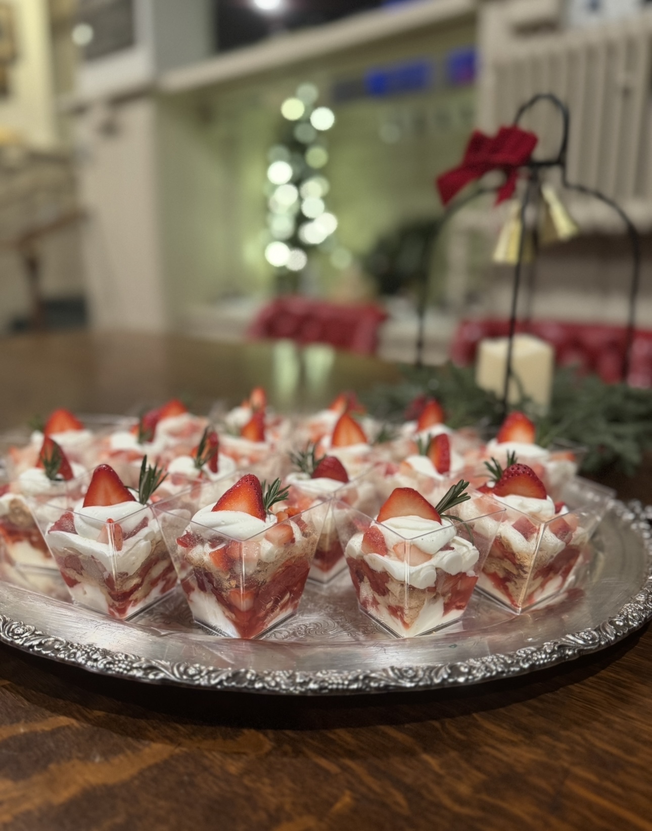 Mini strawberry dessert cups on a silver serving tray
