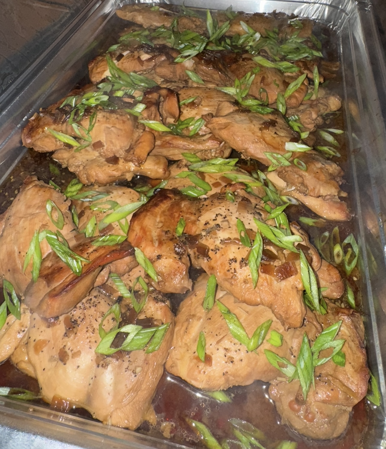 Soy glazed chicken topped with fresh scallions