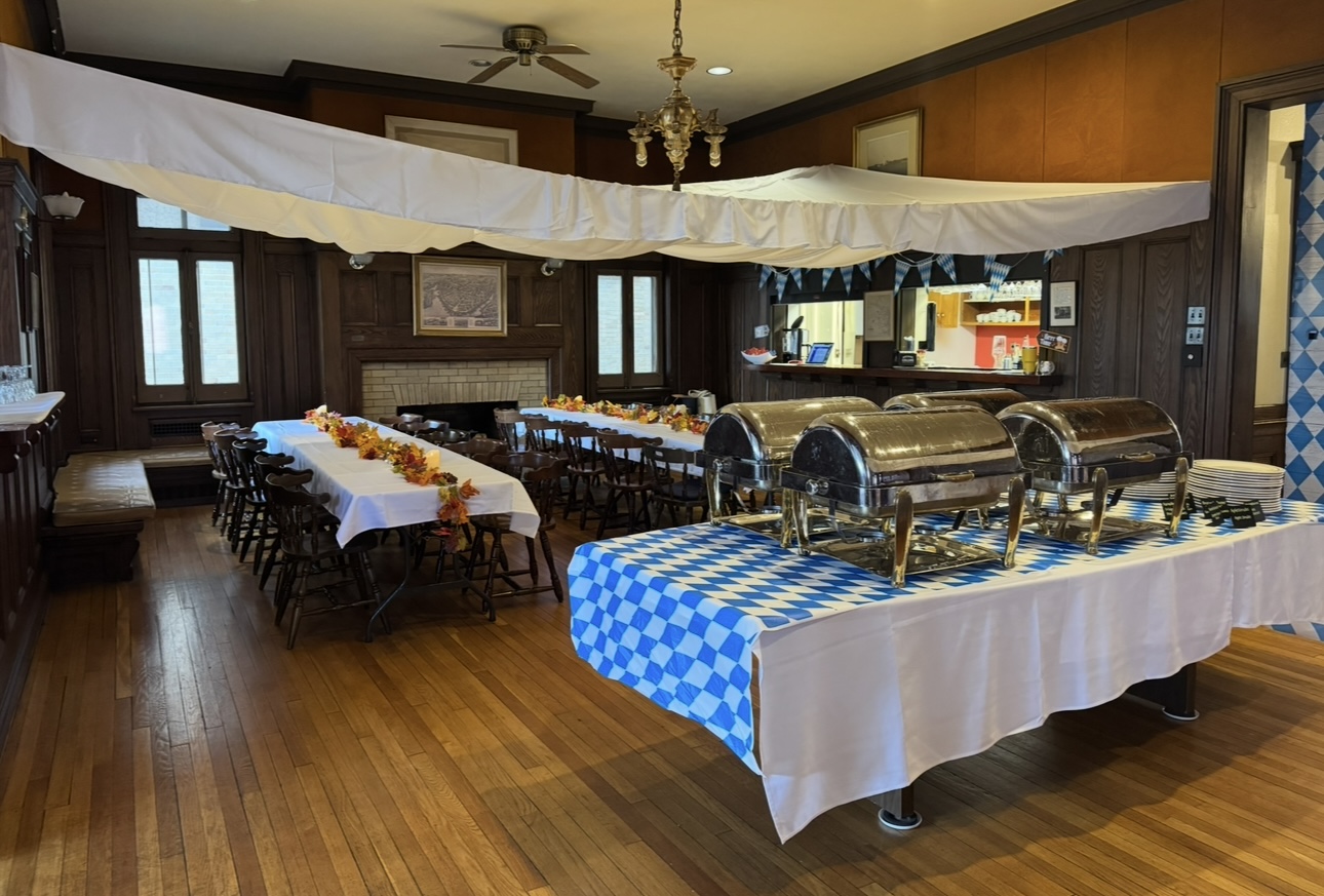 Oktoberfest themed event room with buffet setup