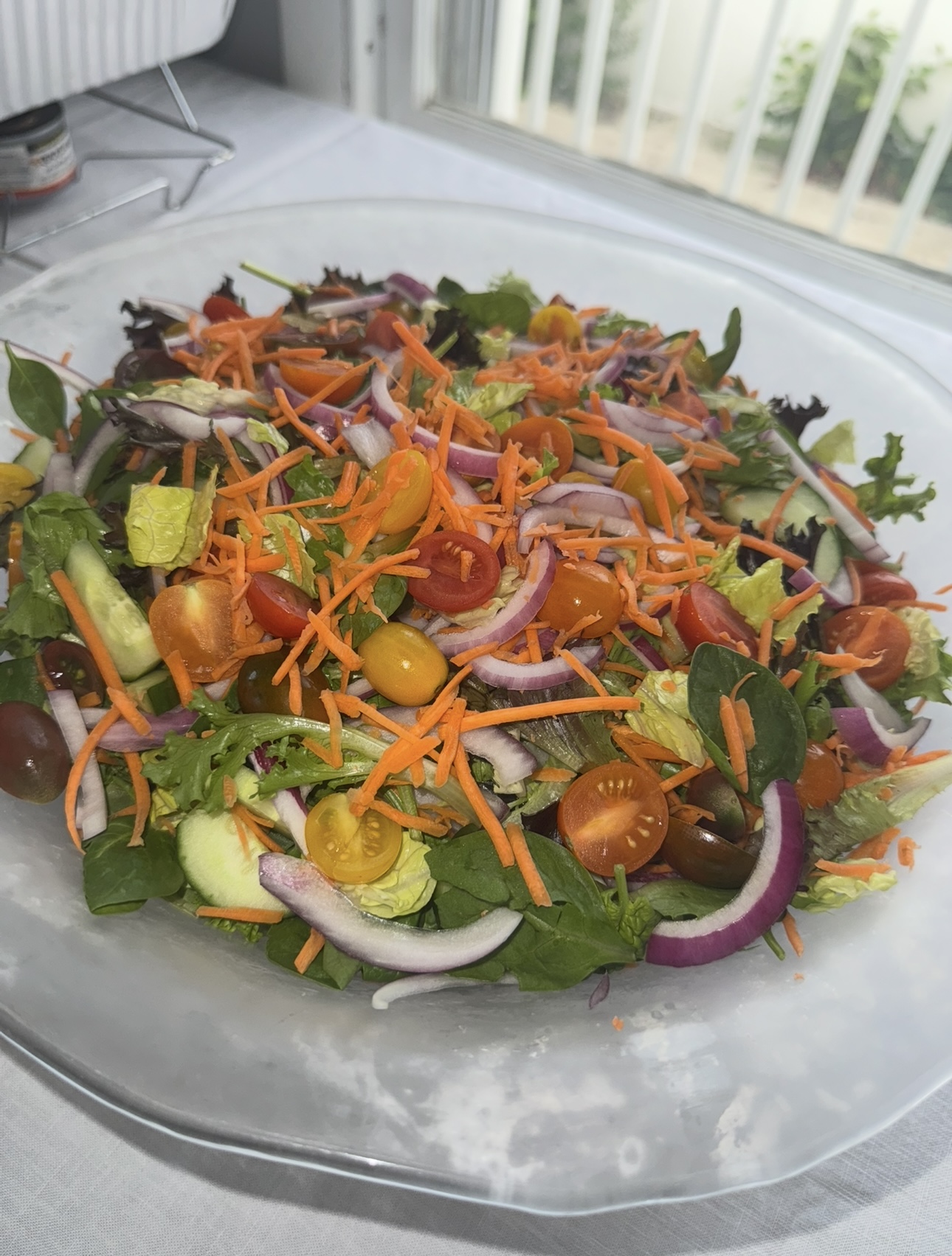 Fresh garden salad with cherry tomatoes and carrots